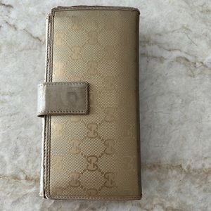 Gold Gucci wallet